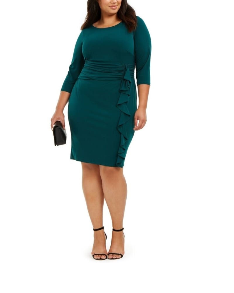 Front of a model wearing a size 22W Jessica Howard Women's Plus Ruched Waist Side Ruffled Dress Green Size 22W in Green by Jessica Howard. | dia_product_style_image_id:313022